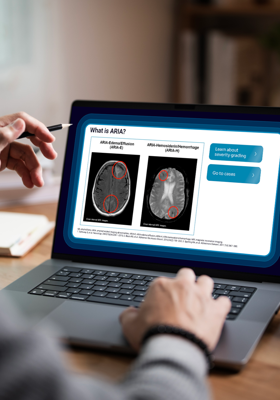 An image showing an individual looking at a computer screen