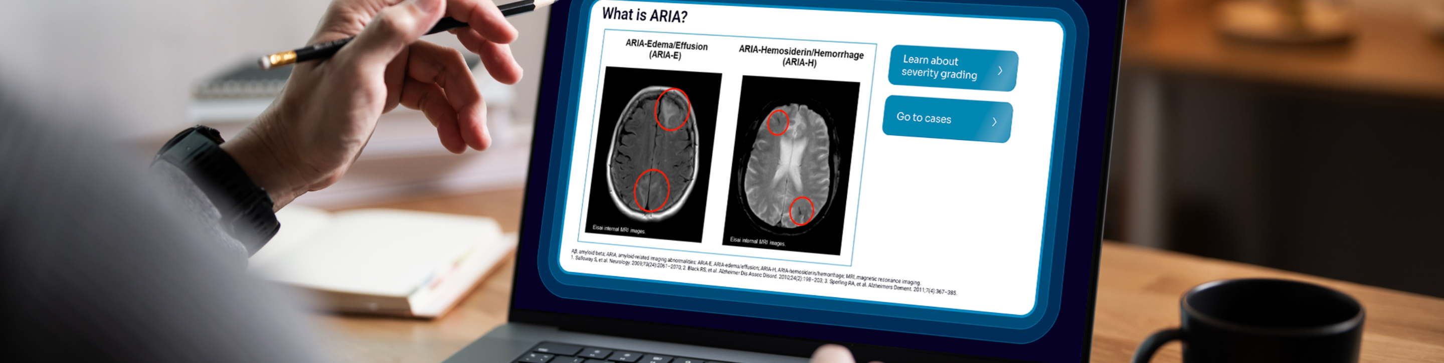 An image showing an individual looking at a computer screen